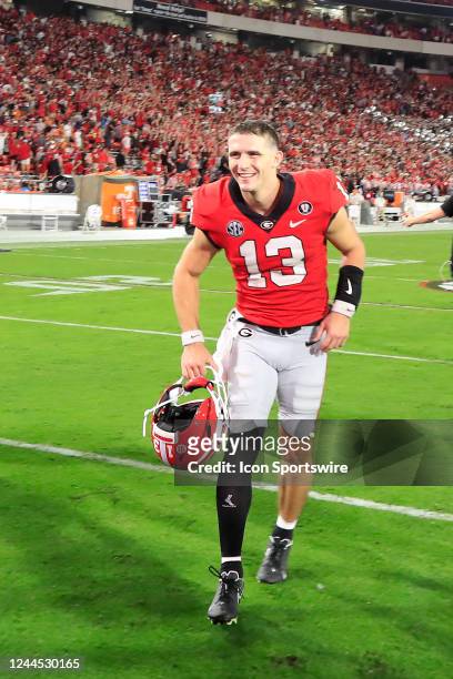 Georgia Bulldogs quarterback Stetson Bennett leaves the field after winning the Saturday afternoon college football game between the University of...
