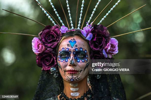 Woman dressed as La Catrina takes part in the 13th Annual Florida Day of the Dead celebration in Fort Lauderdale, Florida on November 5, 2022.