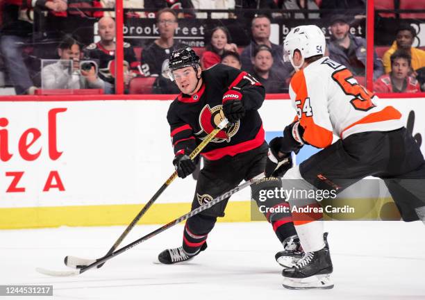 Alex DeBrincat of the Ottawa Senators fires a shot against Egor Zamula of the Philadelphia Flyers at Canadian Tire Centre on November 5, 2022 in...