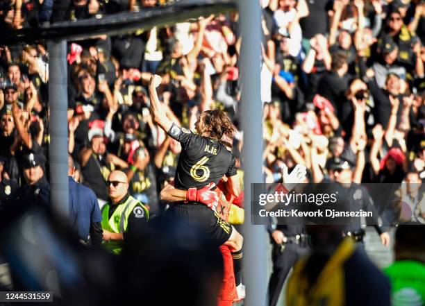 Ilie Sánchez of Los Angeles FC celebrates with goalkeeper John McCarthy of Los Angeles FC after scoring the winning penalty kick to defeat the...