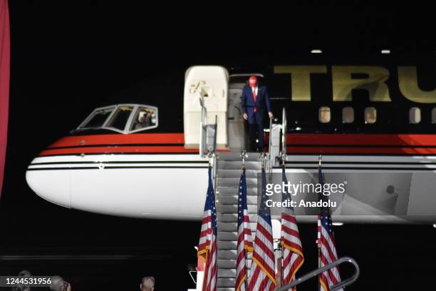 Former President of the United States Donald J. Trump deplanes Trump Force One and delivers remarks during a rally at Arnold Palmer Regional Airport...