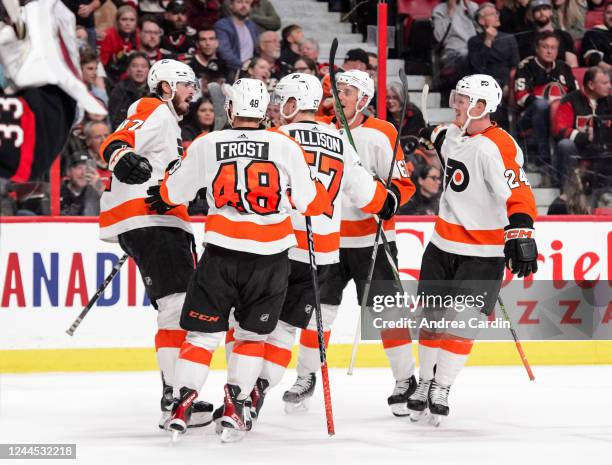 Zack MacEwen of Philadelphia Flyers celebrates his second period goal against the Ottawa Senators with teammates at Canadian Tire Centre on November...