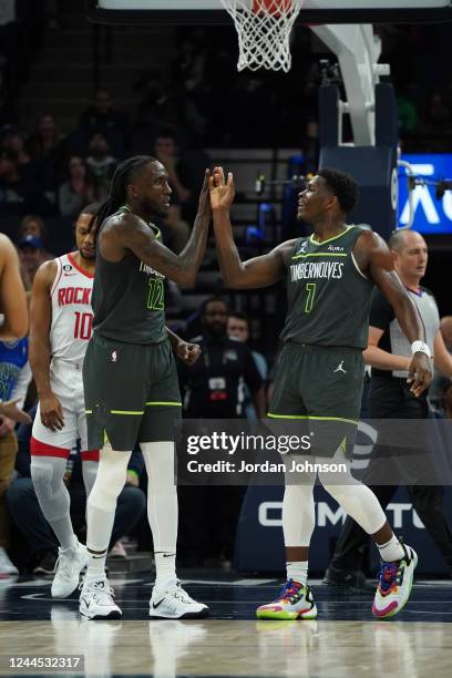 Taurean Prince and Anthony Edwards of the Minnesota Timberwolves high five during the game against the Houston Rockets on November 5, 2022 at Target...