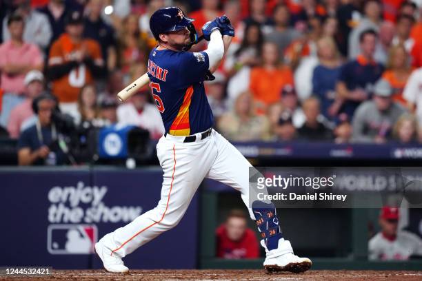 Trey Mancini of the Houston Astros hits a single in the third inning during Game 6 of the 2022 World Series between the Philadelphia Phillies and the...