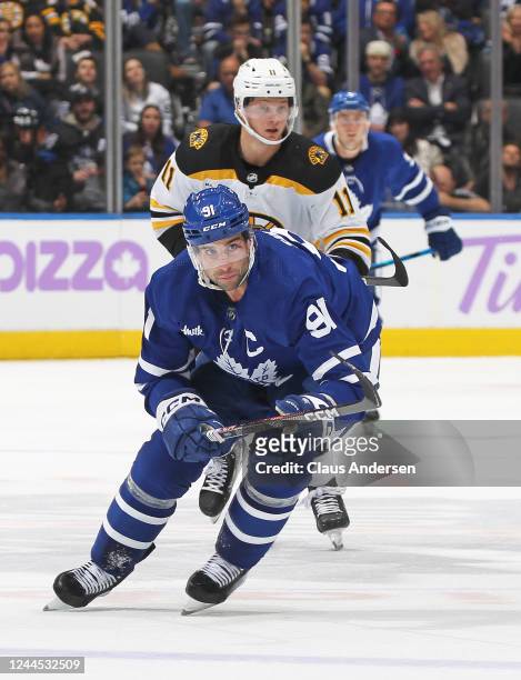 John Tavares of the Toronto Maple Leafs skates against the Boston Bruins during an NHL game at Scotiabank Arena on November 5, 2022 in Toronto,...