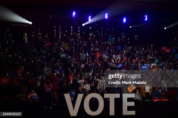 Supporters wave their smartphones during a rally with Pennsylvania Democratic Senate nominee John Fetterman, former U.S. President Barack Obama,...