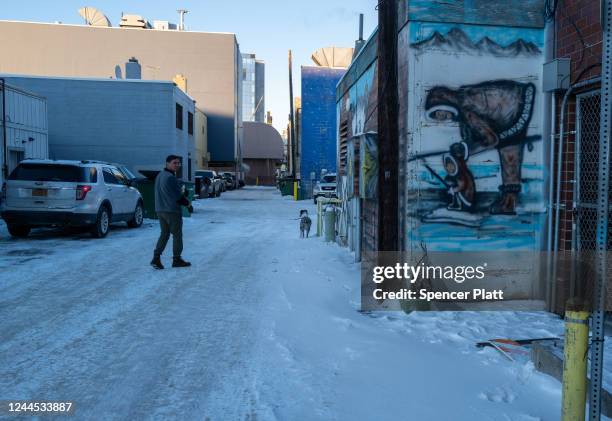 People walk through downtown on November 05, 2022 in Anchorage, Alaska. Early and absentee voting has begun in Alaska for the decisive midterm...