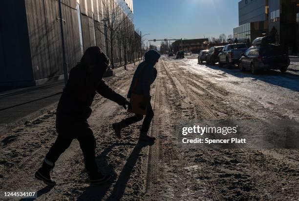 People walk through downtown on November 05, 2022 in Anchorage, Alaska. Early and absentee voting has begun in Alaska for the decisive midterm...