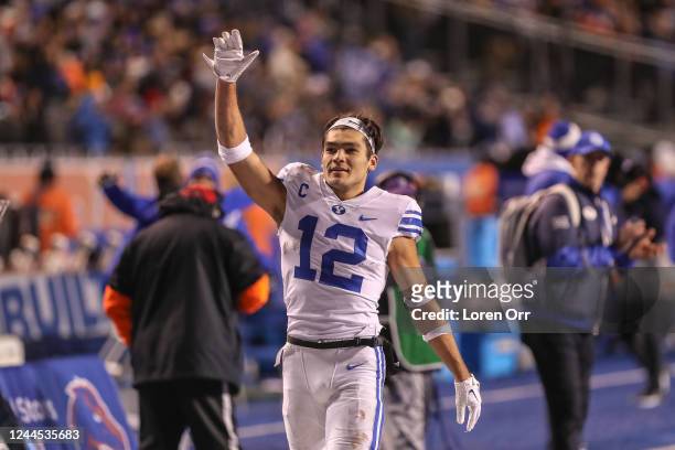 Wide receiver Puka Nacua of the BYU Cougars waves goodbye to the Boise State Broncos crowd during second half action at Albertsons Stadium on...