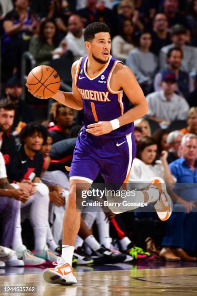 Devin Booker of the Phoenix Suns handles the ball during the game against the Portland Trail Blazers on November 5, 2022 at Footprint Center in...