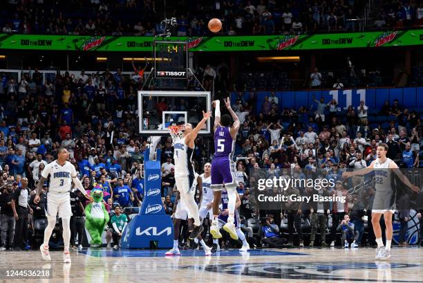 De'Aaron Fox of the Sacramento Kings hits the game winning three point shot against the Orlando Magic on November 5, 2022 at Amway Center in Orlando,...