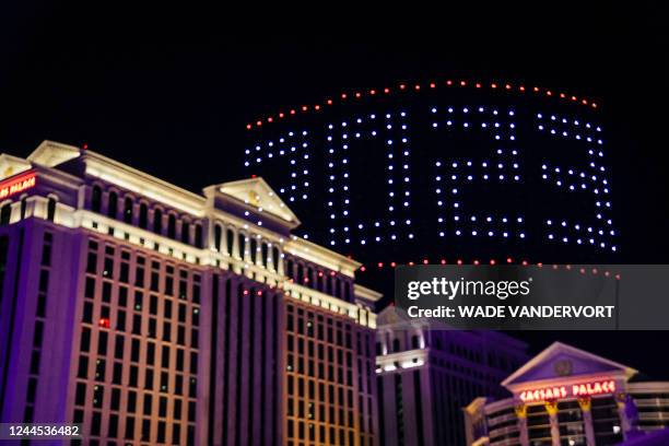 Drone light show is displayed above Caesars Palace during the Formula 1 Las Vegas Grand Prix Launch Party ahead of the 2023 Inaugural Las Vegas Grand...