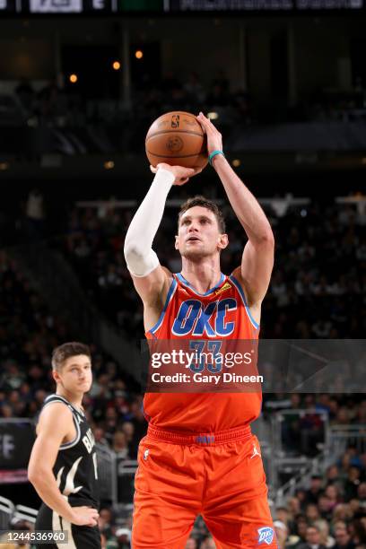 Mike Muscala of the Oklahoma City Thunder shoots a free throw against the Milwaukee Bucks on November 5, 2022 at the Fiserv Forum Center in...