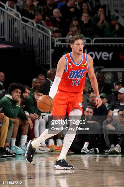 Mike Muscala of the Oklahoma City Thunder handles the ball against the Milwaukee Bucks on November 5, 2022 at the Fiserv Forum Center in Milwaukee,...