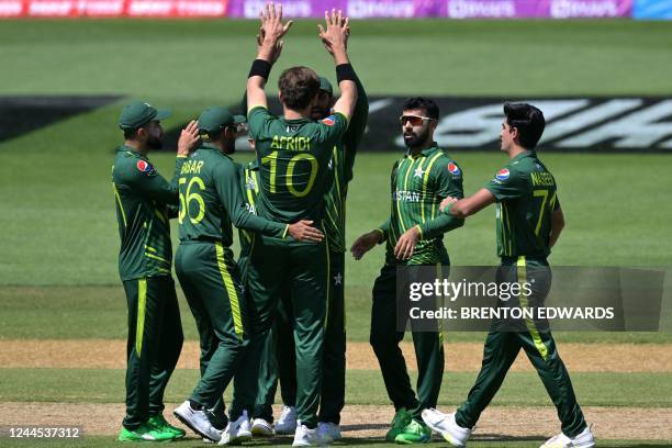 Pakistan's Shaheen Shah Afridi celebrates the wicket of Bangladesh's Litton Das with teammates during the ICC men's Twenty20 World Cup 2022 cricket...