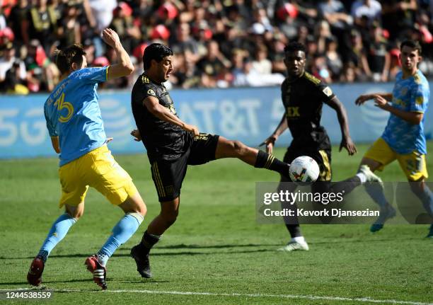 Carlos Vela of Los Angeles FC controls the ball as he is defended by Jack Elliott of Philadelphia Union during the second half of the 2022 MLS Cup...