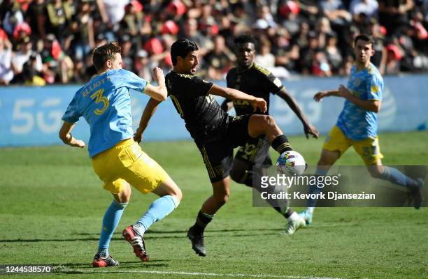Carlos Vela of Los Angeles FC controls the ball as he is defended by Jack Elliott of Philadelphia Union during the second half of the 2022 MLS Cup...