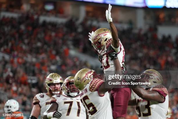 Florida State Seminoles wide receiver Ontaria Wilson celebrates his touchdown reception during the game between the Florida State Seminoles and the...