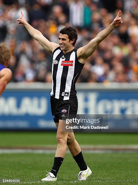 Alex Fasolo of the Magpies celebrates kicking a goal after the final siren during the AFL First Qualifying match between the Collingwood Magpies and...