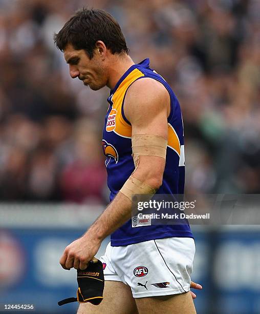 Quinten Lynch of the Eagles looks dejected after his clubs loss in the AFL First Qualifying match between the Collingwood Magpies and the West Coast...