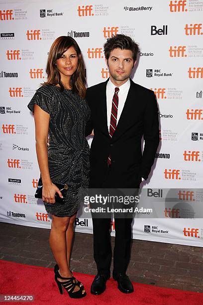 Actor Adam Scott and wife Naomi Sablan arrive at "Friends With Kids" Premiere at Ryerson Theatre during the 2011 Toronto International Film Festival...