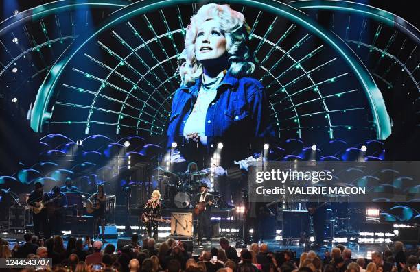 Singer-songwriter Dolly Parton performs during the 37th Annual Rock and Roll Hall of Fame Induction Ceremony at the Microsoft Theatre on November 5...