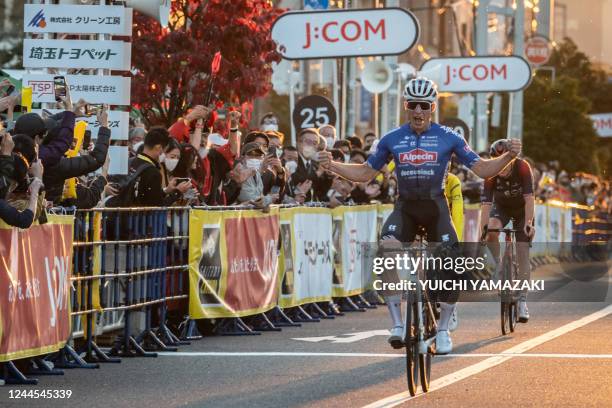 Belgiums Jasper Philipsen of TDF Criterium Legends Team celebrates his win after crossing the finish line in the Tour de France Saitama Criterium...