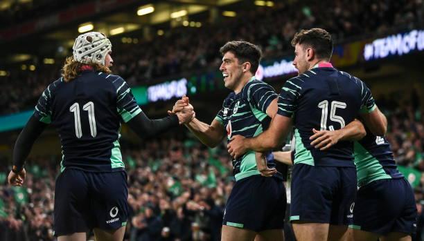 Dublin , Ireland - 5 November 2022; Mack Hansen of Ireland, 11, celebrates with teammate Jimmy O'Brien, centre, after scoring their side's second try during the Bank of Ireland Nations Series match between Ireland and South Africa at the Aviva Stadium in Dublin. (Photo By Seb Daly/Sportsfile via Getty Images)