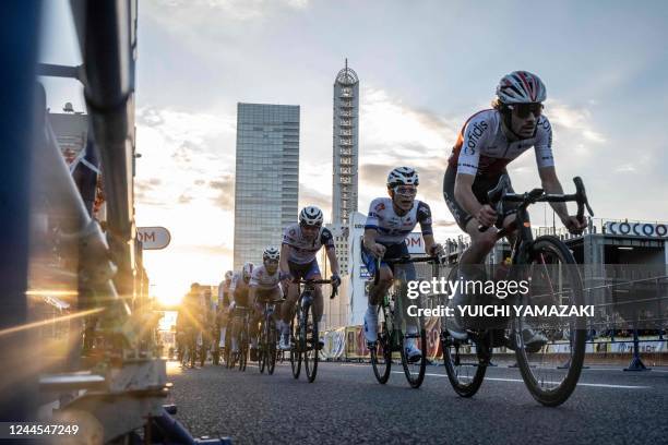 Riders compete in the Tour de France Saitama Criterium cycling race in Saitama on November 6, 2022.