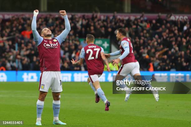 Aston Villa's Argentinian midfielder Emiliano Buendia after Aston Villa's French defender Lucas Digne scores his team's second goal during the...