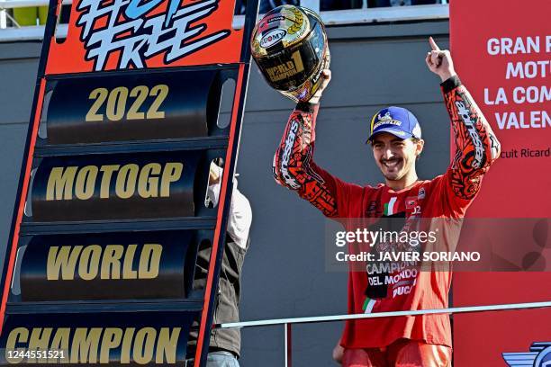 Ducati Italian rider Francesco Bagnaia celebrates as he won the World Championship's title after the Valencia MotoGP Grand Prix race at the Ricardo...