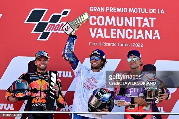 South African rider Brad Binder, Suzuki Spanish rider Alex Rins and Ducati Pramac Spanish rider Jorge Martin celebrate on the podium after the...