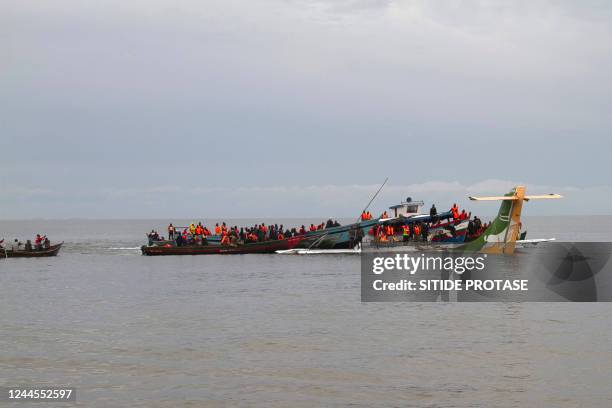 Rescuers search for survivors after a Precision Air flight that was carrying 43 people plunged into Lake Victoria as it attempted to land in the...