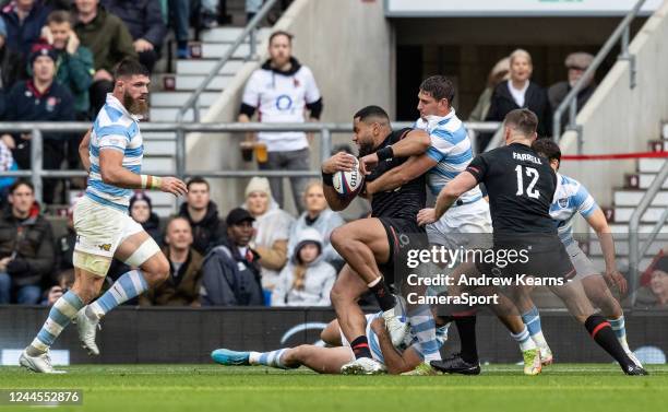 Joe Cokanasiga of England rolls off of his tackler to score Englands first try during the Autumn International match between England and Argentina at...