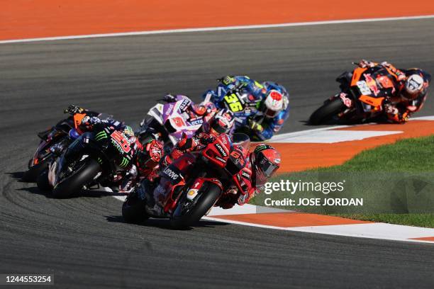 Yamaha French rider Fabio Quartararo and Ducati Italian rider Francesco Bagnaia compete during the Valencia MotoGP Grand Prix race at the Ricardo...