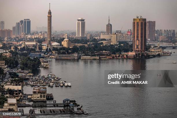 This picture taken on November 1, 2022 shows a view of the skyline of Egypt's capital Cairo, showing the landmark Cairo Tower built in 1961, the...