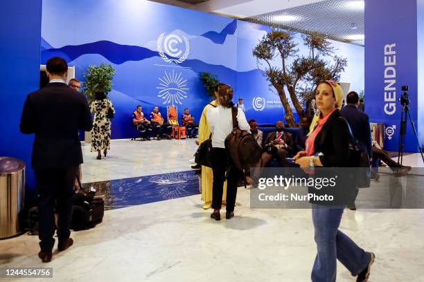 Participants walk in the Atrium as the COP27 UN Climate Change Conference opens today, held by UNFCCC in Sharm El-Sheikh International Convention...