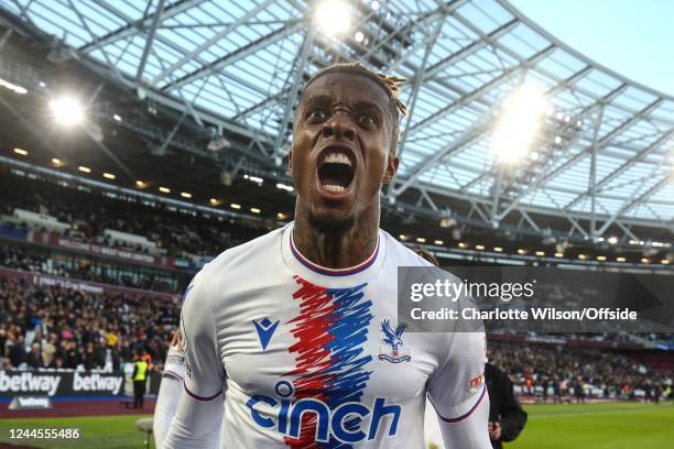 Wilfried Zaha of Crystal Palace celebrates their winning goal during the Premier League match between West Ham United and Crystal Palace at London...