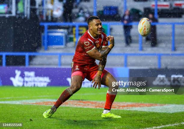 Tongas Sione Katoa scores his side's third try during the Rugby League World Cup quarter final match between Tonga and Samoa at The Halliwell Jones...