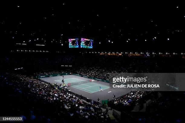 Spectators watch the men's singles final tennis match between Denmark's Holger Rune and Serbia's Novak Djokovic on day 7 of the ATP World Tour...