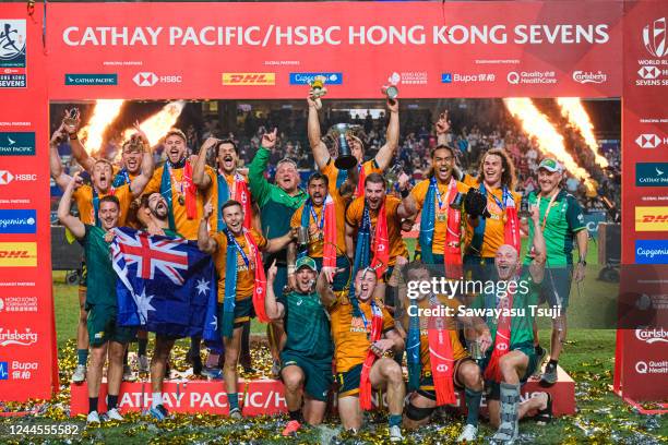 Team Australia pose for photos with trophy after defeating Fiji on day three of the Cathay Pacific/HSBC Hong Kong Sevens at the Hong Kong Stadium on...