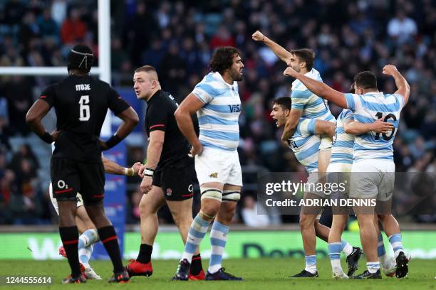 Argentina players celebrate after the final whistle of the Autumn International rugby union match between England and Argentina at Twickenham...