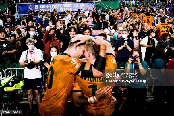 Team Australia celebrate with the trophy after defeating Fiji on day three of the Cathay Pacific/HSBC Hong Kong Sevens at the Hong Kong Stadium on...
