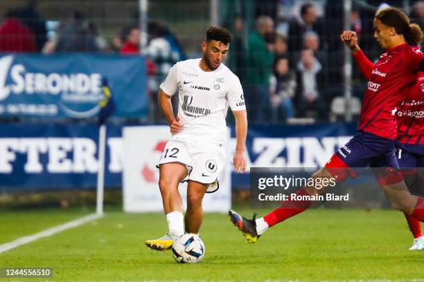Jordan FERRI of Montpellier and Yanis MASSOLIN of Clermont during the Ligue 1Uber Eats match between Clermont Foot 63 and Montpellier HSC at Stade...