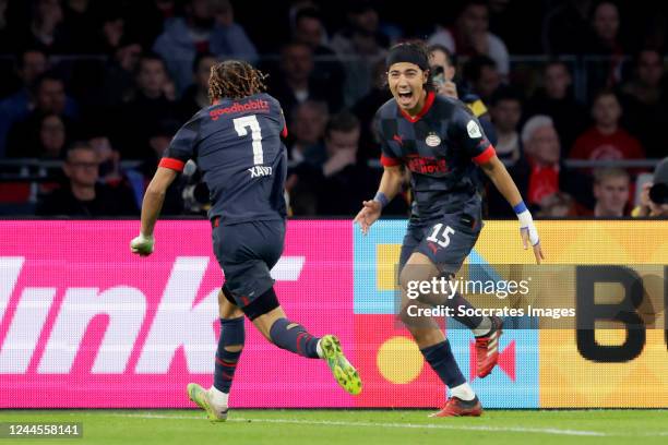 Erick Gutierrez of PSV celebrates 0-2 with Xavi Simons of PSV during the Dutch Eredivisie match between Ajax v PSV at the Johan Cruijff Arena on...