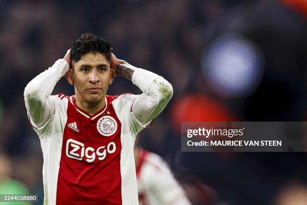 Ajax's Mexican defender Edson Alvarez reacts during the Dutch Eredivisie match between AFC Ajax and PSV Eindhoven at the Johan Cruijff Arena in...