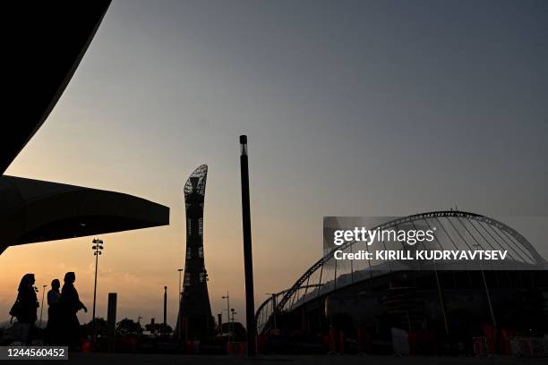 Women leave the metro station in front of the Khalifa Stadium in Doha on November 6 ahead of the Qatar 2022 FIFA World Cup football tournament.