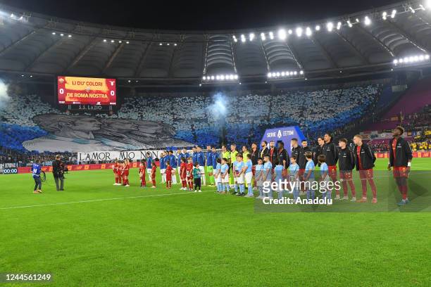 Players of each team line up prior to the Serie A week 13 derby match between AS Roma and SS Lazio at the Stadio Olimpico on November 6, 2022 in...
