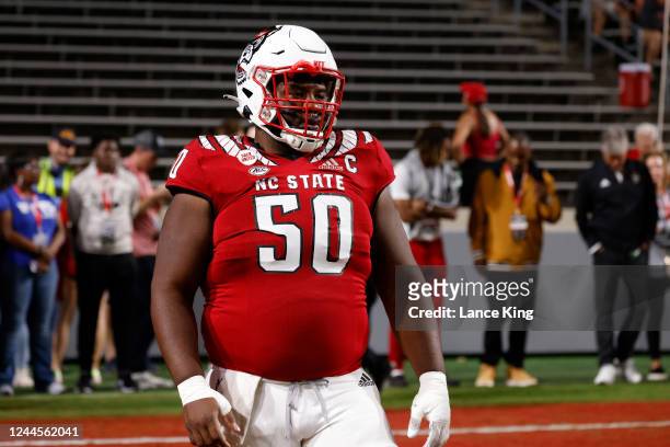 Grant Gibson of the North Carolina State Wolfpack warms up prior to their game against the Wake Forest Demon Deacons at Carter-Finley Stadium on...