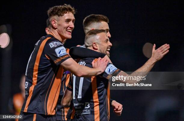 Derry , United Kingdom - 6 November 2022; Keith Ward of Dundalk celebrates with teammates John Martin, left, and Darragh Leahy after scoring their...